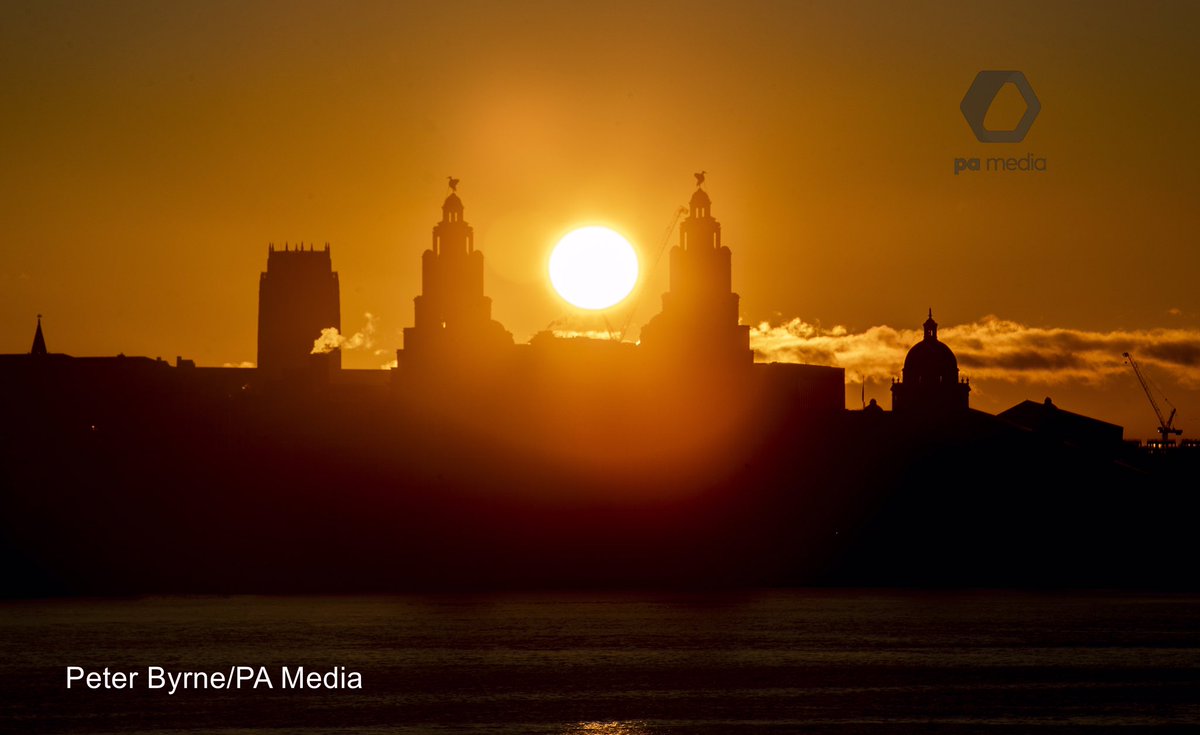 The sunrise behind the Liverpool Skyline and the River Mersey #sunrise #liverpoolwaterfront #StormHour #weather #merseyferry #dazzleferry
