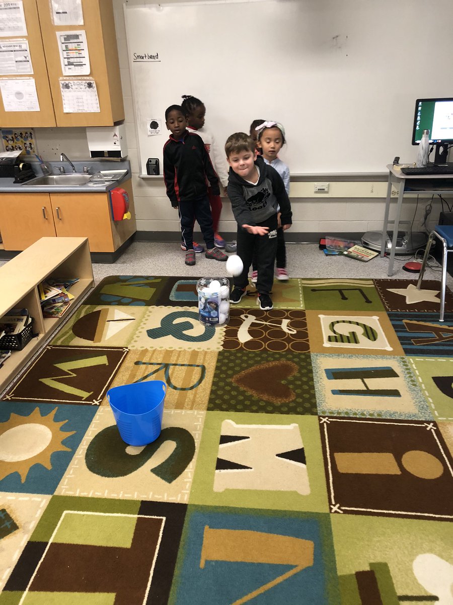 MrsCillis's tweet photo. We are having an indoor snowball toss competition. Students are trying to get their snowballs into the bins. Once done they must count how many they got in each bucket. #onetoonecorrespondence #stableorder #countingprincipals https://t.co/R59Ha1SKjY