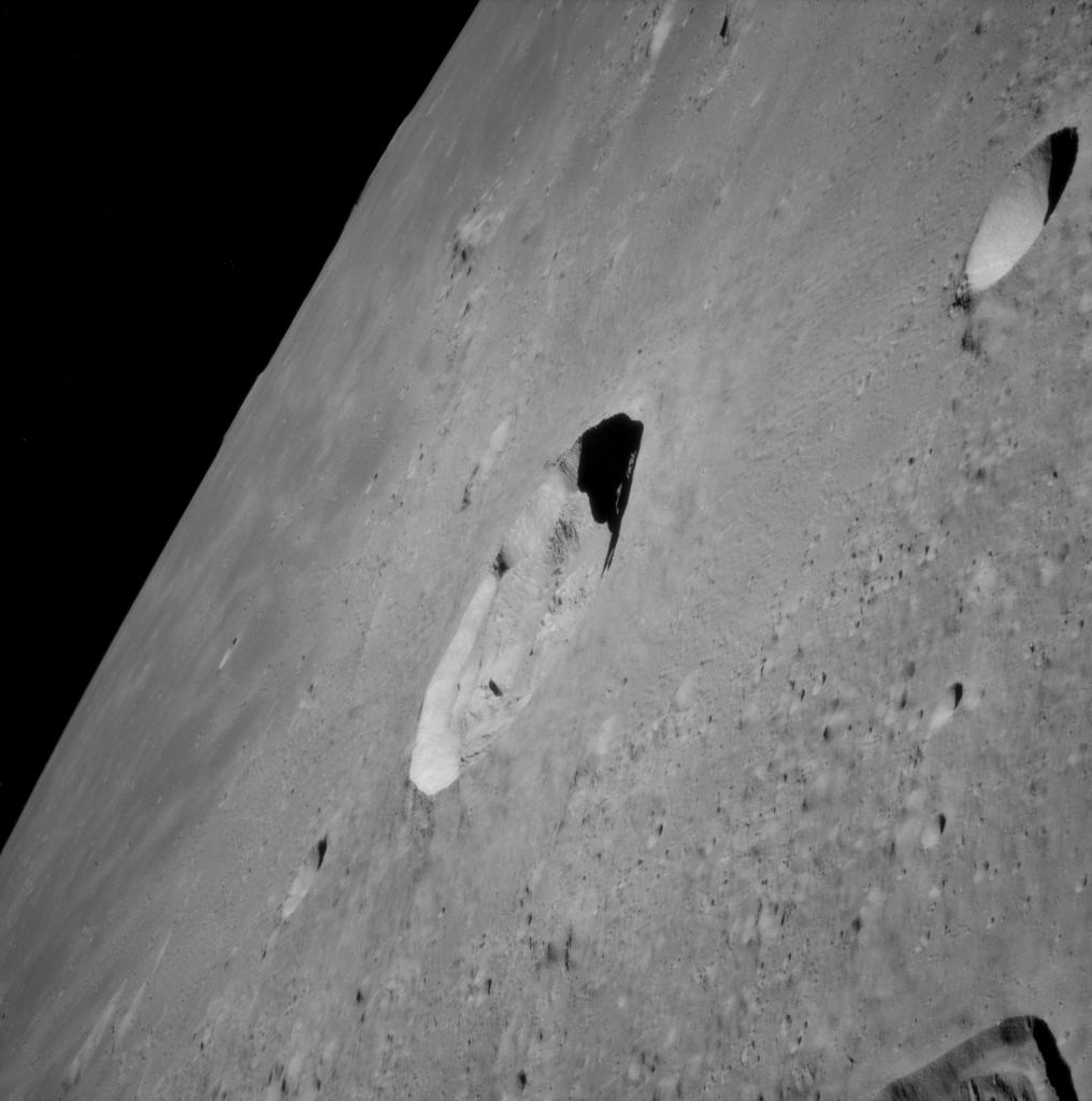 Moon's surface and large craters as seen from Apollo 12 in lunar orbit.