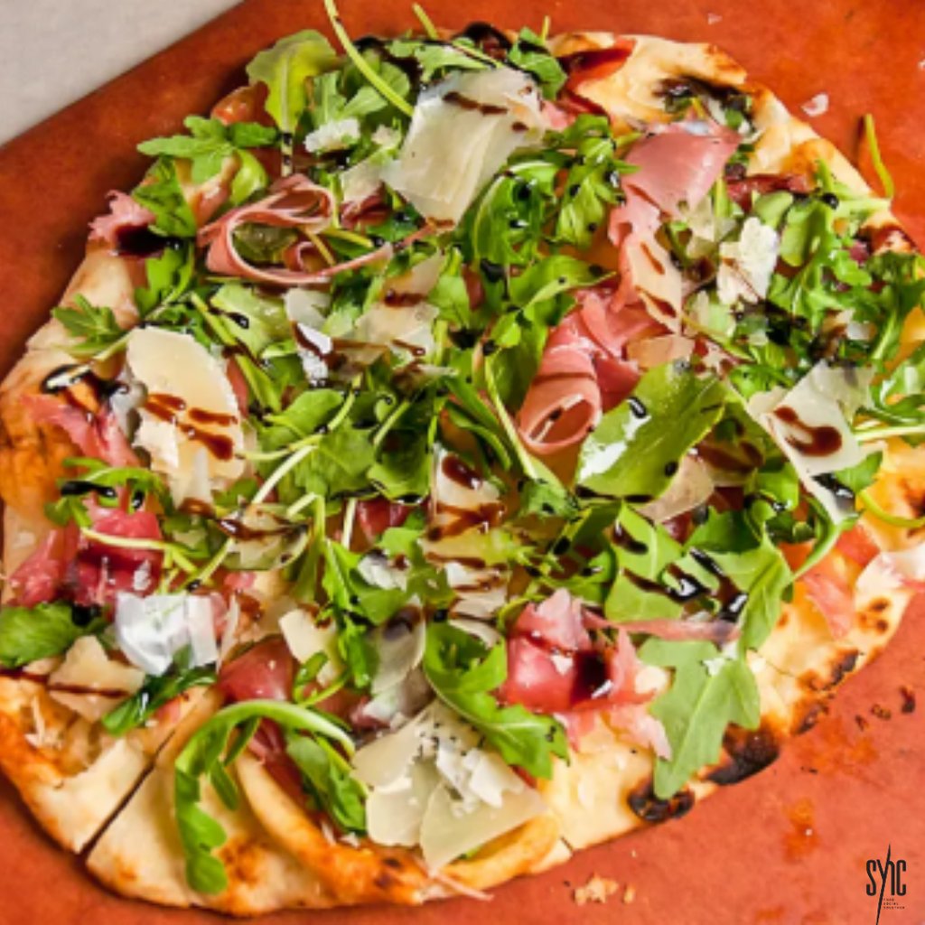 sync_exton's tweet image. Our Italiano flatbread is now certified as a cure for Monday blues; even better, you can order it online through @doordash! 💙🍕