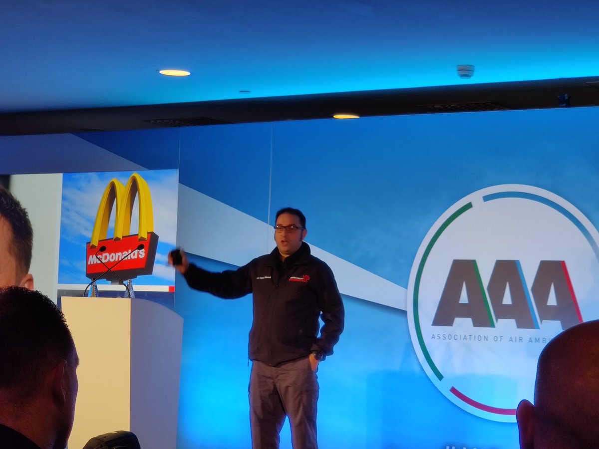 AdamP_UK's tweet photo. Dr Syed Masud TVAA Medical Director talks on collaboration in the sector. (He doesn't mean collaborating with McDonalds just an ill timed photo) #AAA19 #ALLFORONE https://t.co/DrLmTmlpQI