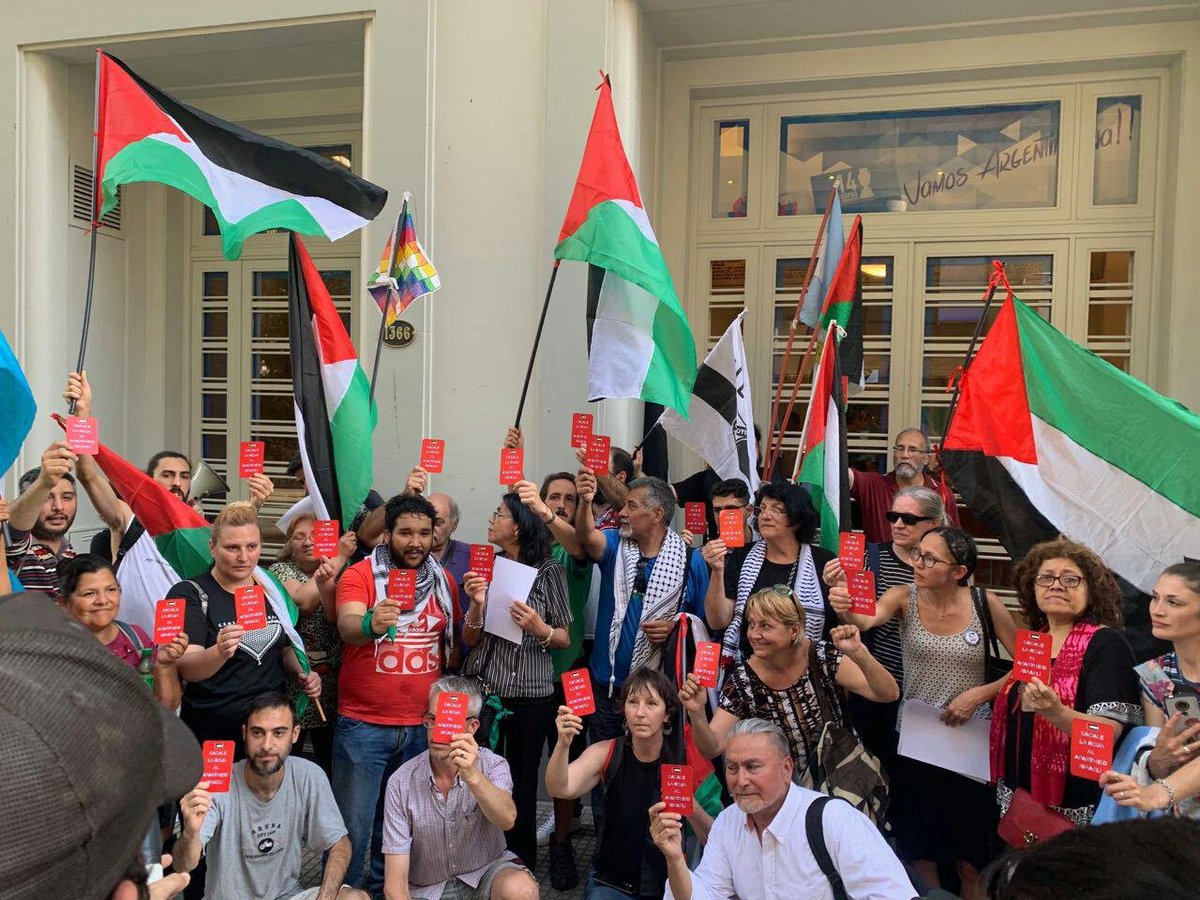 PACBI's tweet photo. No one wins when sport is used to hide Israeli apartheid.

@Argentina &amp; @Uruguay both lost a chance to stand up for human rights.

Thanks to 1000s worldwide, in Montevideo, Buenos Aires, Barcelona, who stood with the Palestinian struggle for freedom, justice &amp; equality. #ARGURU https://t.co/QDf4XSYZ3i