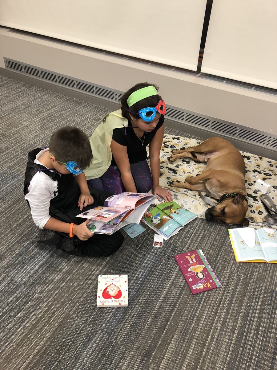 DawnLutz's tweet photo. Fox Valley Reading Council loves sponsoring IL Reads at the Santori Aurora Public Library! Kids got super hero masks & capes and read to Fox Valley Therapy Dogs! We loved Granger & Hamilton with Laura & Bridget! Thanks to all! #FVRC #AuroraPL #FoxValleyTherapyDogs https://t.co/8WUZ6ZVkA3