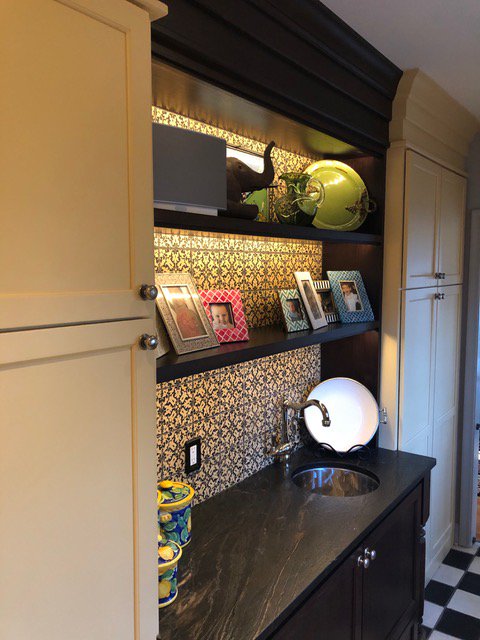 DFConstruction's tweet photo. Dreaming of adding a touch of class to your #kitchen? Check out this custom built bar, complete with tile behind the shelving, a leather counter top, and perfect ambient lighting. #classykitchens #remodeling 
https://t.co/lIhyRAOzBJ https://t.co/NZoXnRRxU7