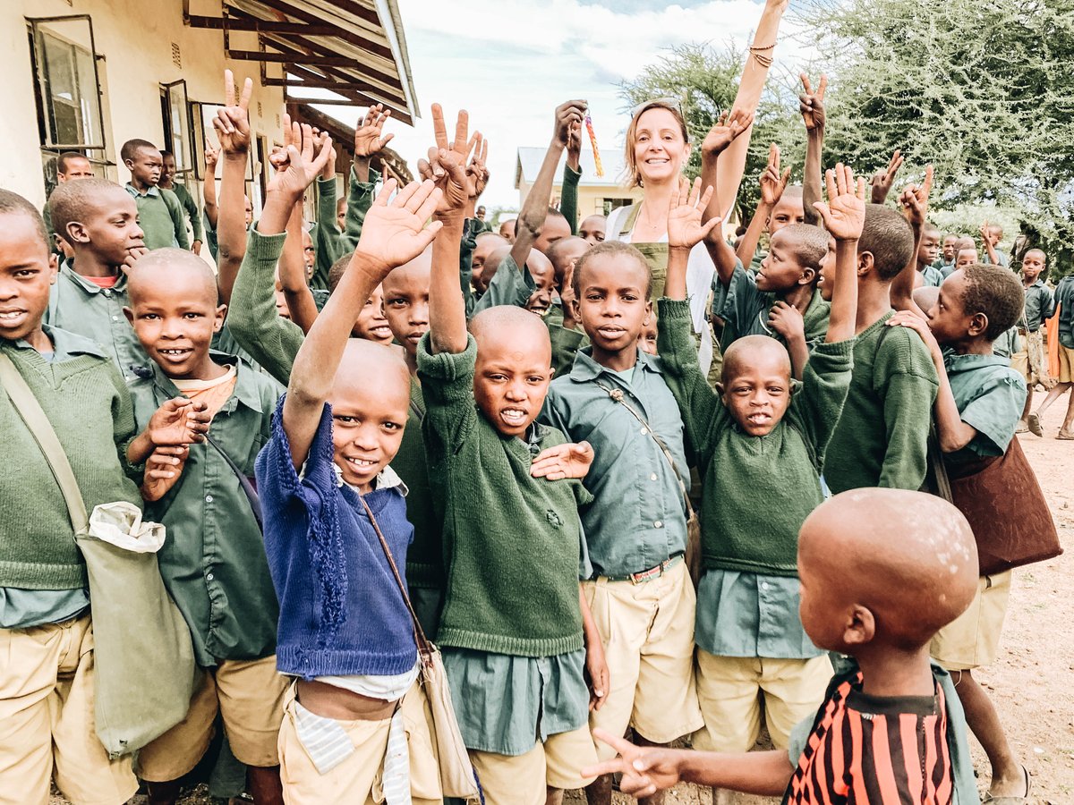 BucketListJrny's tweet photo. One of my favorite things I did in Tanzania on my #shadowsofafrica safari was go to Ol Mesera school to visit the children. We spent time in each classroom, and even learned some Swahili! The kids were just excited as me that we were there 😊 https://t.co/ROfRqpSeg8