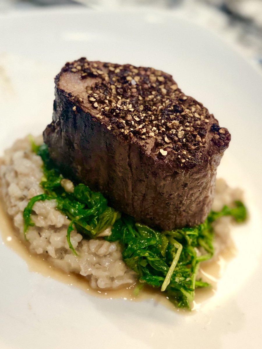 Here’s one for the #Carnivores Peppercorn encrusted Beef Tenderloin served on a bed of  creamy risotto and sautéed arugula. #meat #risotto #delicious