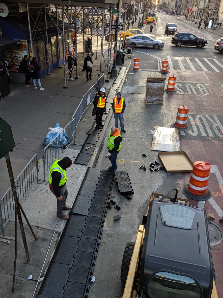 NYC_DOT's tweet photo. Crews continue to install bus boarding platforms at seven M14 A/D #SelectBusService stops. These platforms provide a dedicated space for riders to board, making access easier & safer. 🚌🚶♂️
📷: Installation of a bus boarding platform at 7th Ave and 14th St last week. https://t.co/MpNhhIP0N8