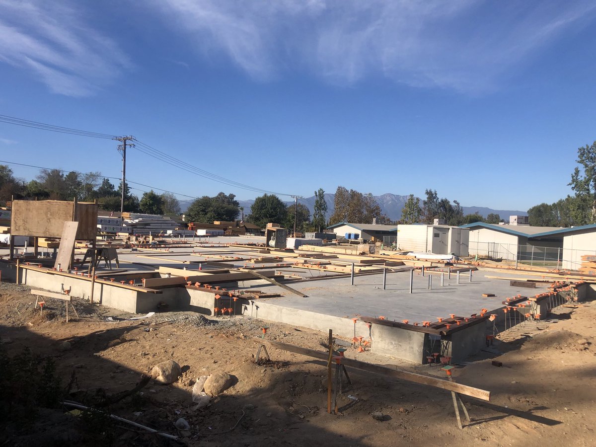 Construction update! Behold the foundation of our new front office and library.