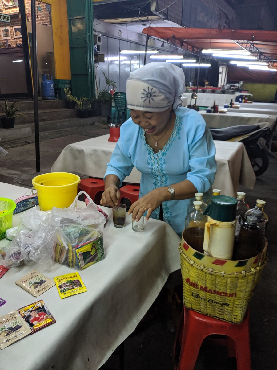 FreyaRoseG's tweet photo. It was fascinating to learn about the Indonesian herbal drink #jamu at a traditional stall on the street in #Jakarta, and then to see how it's been repackaged and rebranded for the younger generation in M Bloc at Suwe Ore Jami. #wonderfulindonesia @indtravel @KBRILondon https://t.co/SKeu5BZY4I