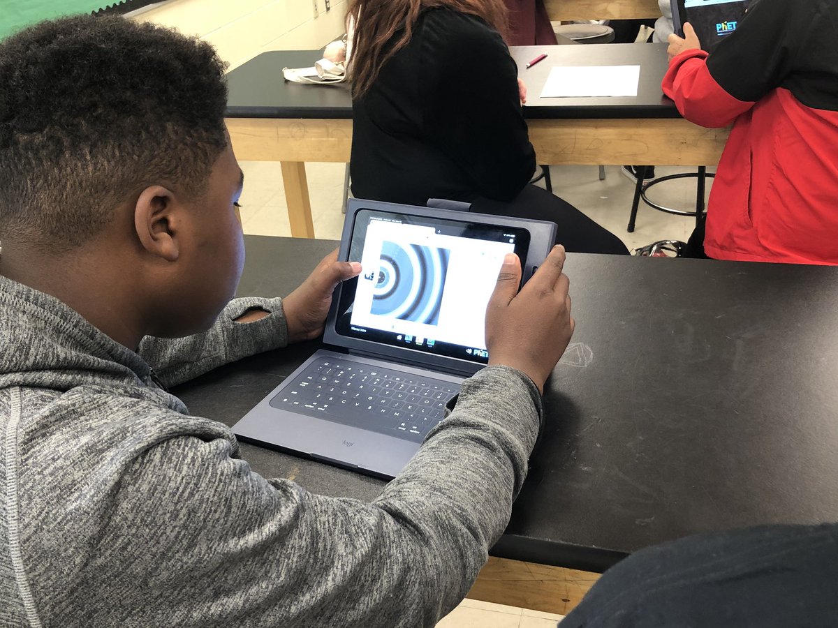 AmsCalloway's tweet photo. Invesitgating waves as we dive into a new topic. Students worked in pairs to develop a definition of amplitude and frequency. Fun to watch them work through what it is and what it isn’t. #tweetcher @AMSjackets @StarkvilleSD https://t.co/xQtJ3OxCVc