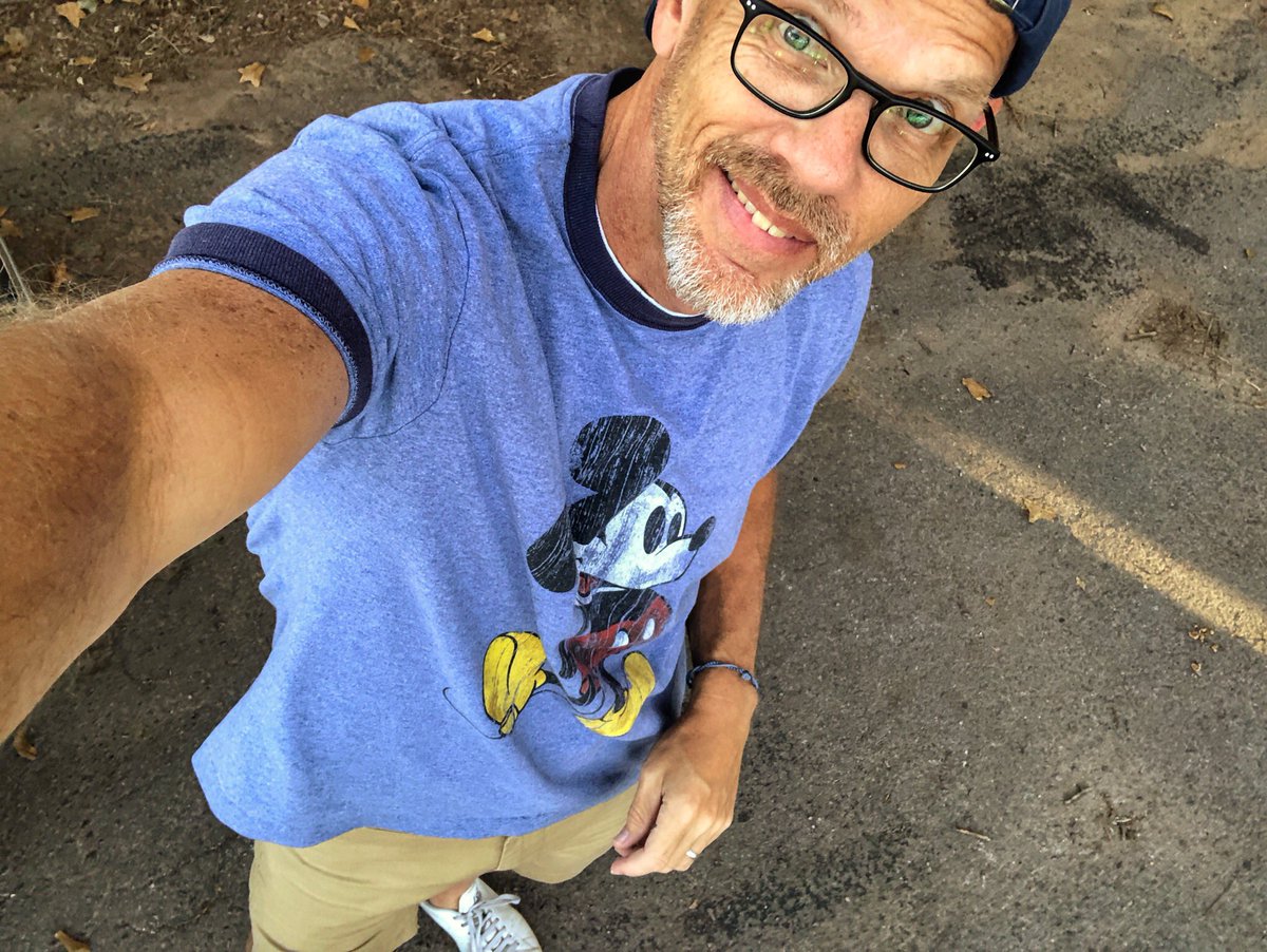 EnidBuzz's tweet photo. Happy Birthday to my buddy Mickey Mouse! Sunshine, shorts and sneakers on this 70+ degree November day. Are your Christmas lights up? #thatbuzzguy #shortsandsneakers https://t.co/FhETOSy8fs