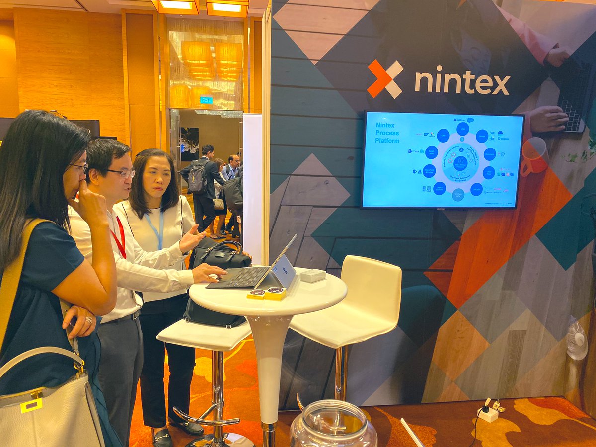 ETnintex's tweet photo. Our very own @kknintex deep in demos even before the keynote at #SSOWAsia 2019! Come have a chat with the friendly team at the @Nintex booth on how we can help transform your business operations with our #processexcellence platform. https://t.co/mO0Ii381lb
