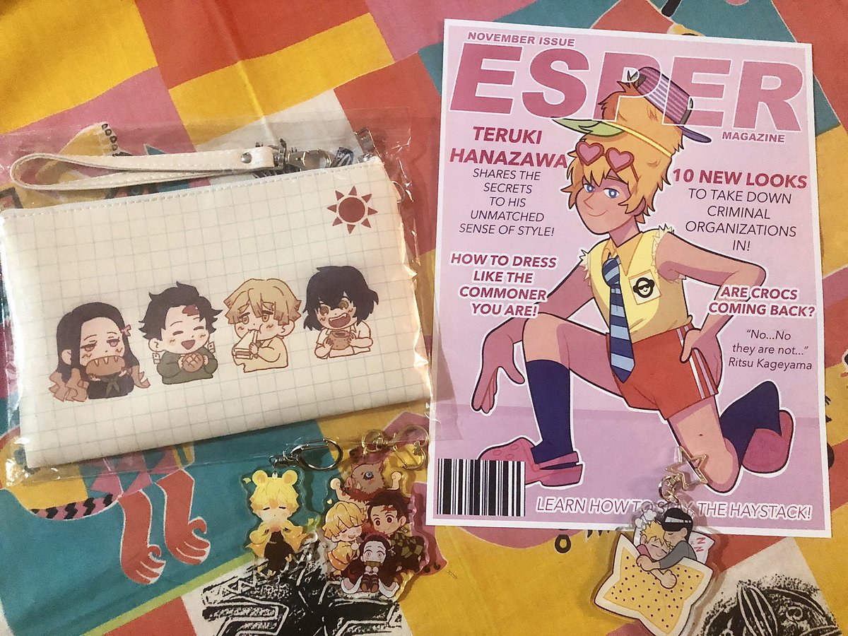 NEXT UP!!!!!! the KNY pouch, zenitsu charm, and KNY trio charm were by @qiabata !!!!! the charms were a day 1 buy I wore them all weekend!!! THE TERU PRINT AND THE TERUMOB CHARM WERE BY @billiefoot !!!!! terumob is honestly perfection your brain is huge and this charm is SO CUTE 