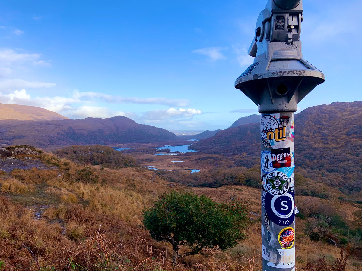 thatmusic98's tweet photo. @nowthisisliving I hope this sticker is waterproof. It was on my camera bag but these polls were covered in them, so I thought where better to put it than in such a beautiful spot. #ladiesview #killarney #ringofKerry #Ireland #NTIL https://t.co/AVUoCcO0gW