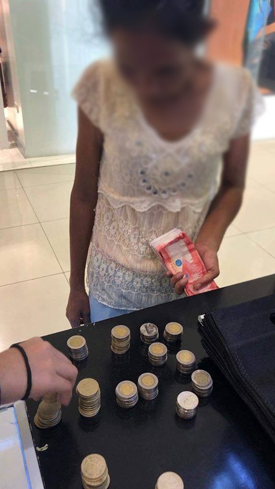 PhilippineStar's tweet photo. A MOTHER’S LOVE

A cellphone store in Lapu-Lapu City shared a touching story of a mother who used all her savings, most of them came in coins, to buy her daughter her first-ever cellphone. (Photos courtesy of K &amp; L Marketing) https://t.co/Q2EvxGJxgw
