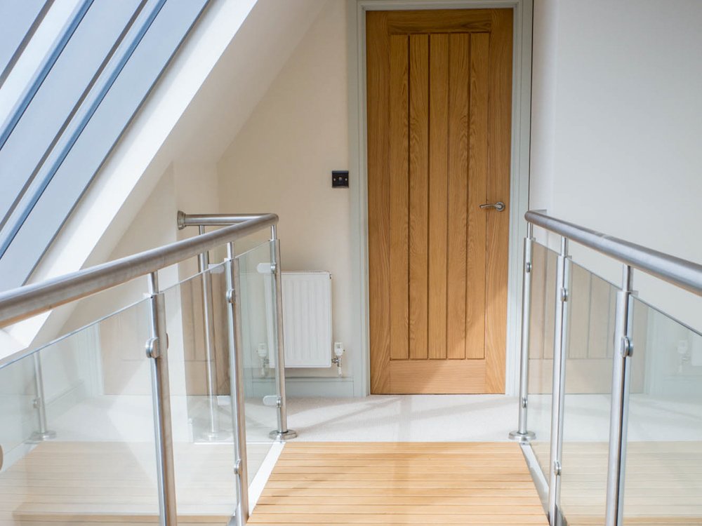 BRIDGE THE GAP We incorporated a link bridge connecting the mezzanine floors using glass panels to maintain the open design of the building. #BuildingABetterNorfolk Norfolk Builders & Property Developers Email: info@grocottandmurfit.co.uk Tel: 01328851420 grocottandmurfit.co.uk