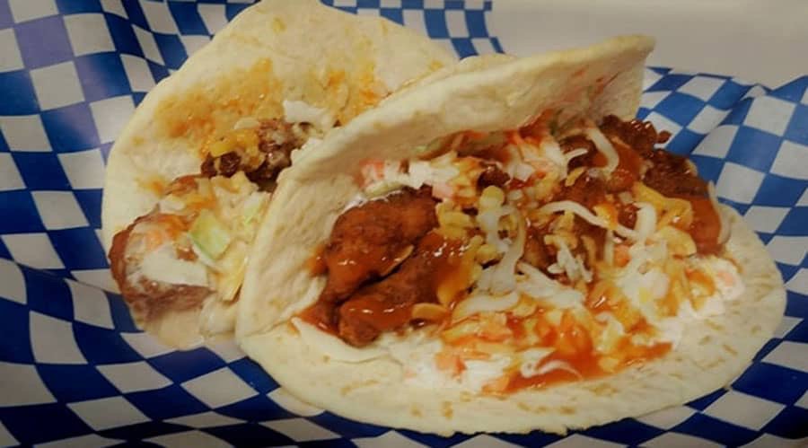 TwitCoast's tweet photo. This #HFXTacoWeek, try @OasisPub Honey Hot Chicken Taco 🌮 Voodoo Chicken Bites tossed in spicy honey mustard, house-made slaw and Pub Mix cheese on a soft shell 😋 https://t.co/aCWcIJ4aQz