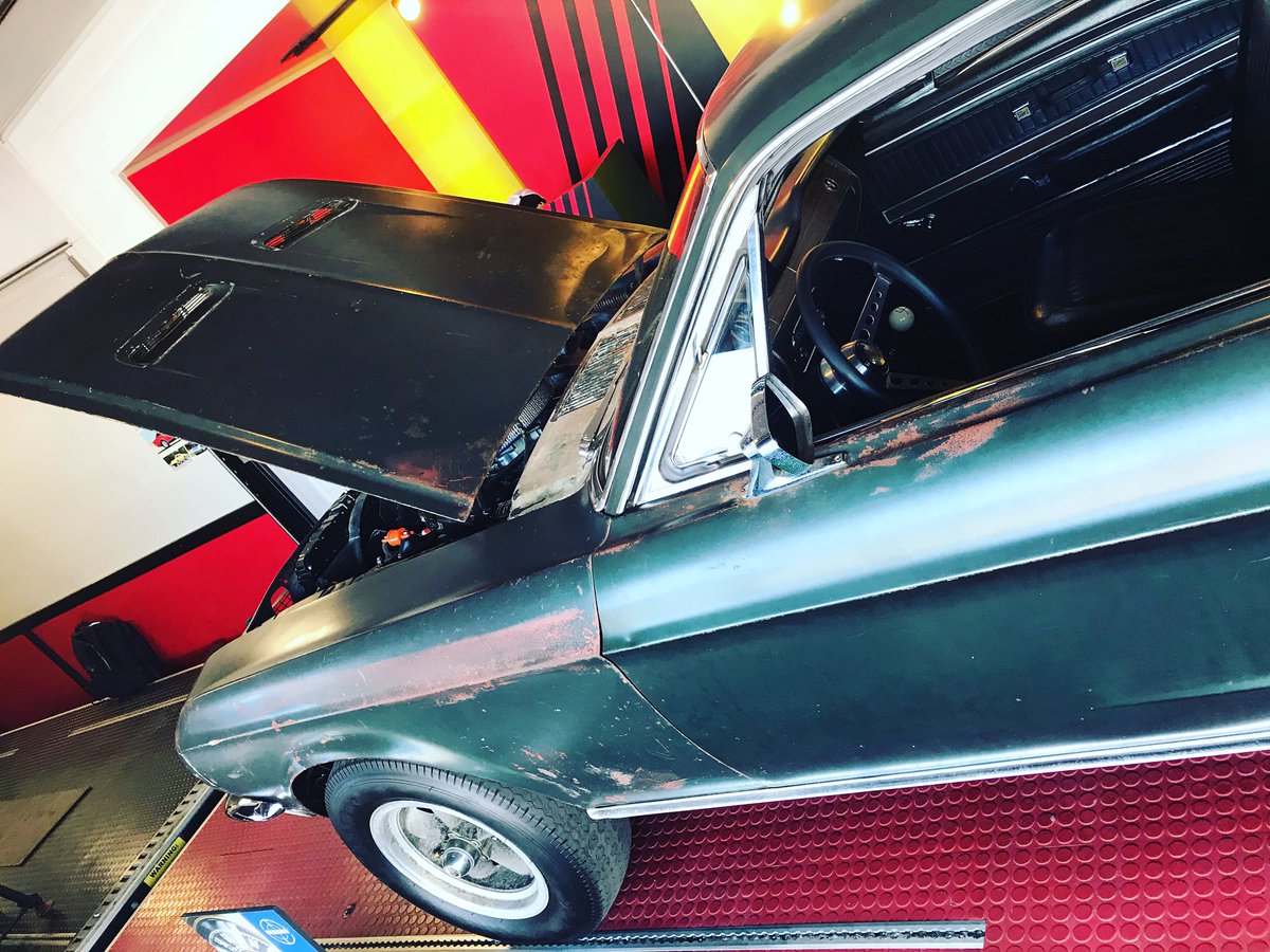 This is Steve McQueen’s Bullitt Mustang. Not a replica. On display at the Mecum Auction trailer @semashow #torqueamerican #mustang