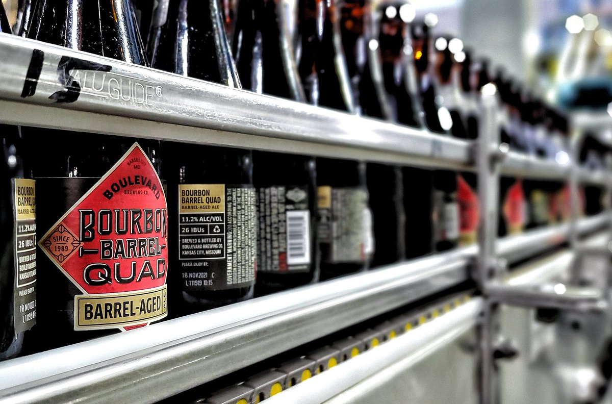 Boulevard_Beer's tweet photo. When Bourbon Barrel Quad bottles are waiting in line to be put into 4-packs, is it a BBQueue? (We'll see ourselves out) https://t.co/Zp4XDyGJHK