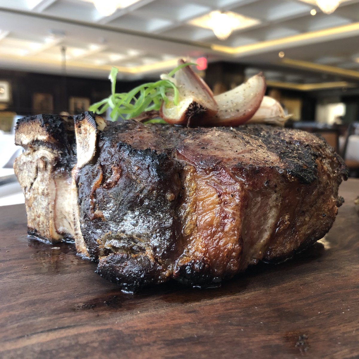 Choices are hard. Our 48-ounce bone-in porterhouse steak makes it so you can enjoy the best qualities of sirloin and tenderloin cuts together. But it's big enough for two, so you still need to decide whom to share it with.