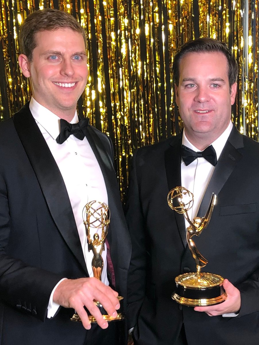 LAAlumniNetwork's tweet photo. Congratulations to @MikeLoweReports '97 for his 25th career Emmy win! Over the weekend, Lowe received Emmy wins for Outstanding General Assignment Reporter and Outstanding Writer. Lowe is pictured with #LAalum Kevin Creevy '08. https://t.co/zXEtBRTs6r