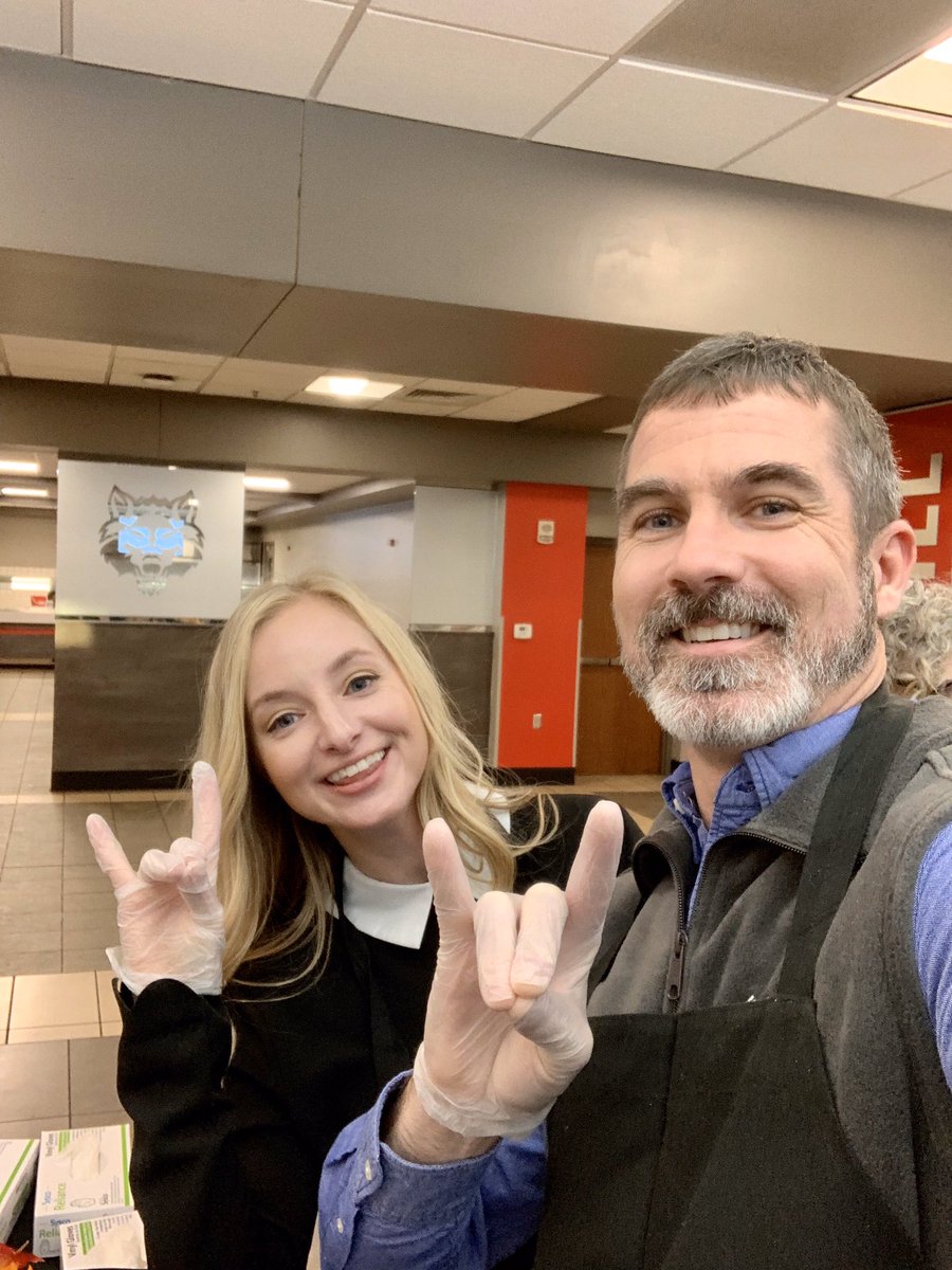 astate_dpem's tweet image. Professors Joseph Richmond &amp;amp; Amy Hyman served dinner to students this evening at the annual Thanksgiving dinner in the Acansa Dining Hall.  Who doesn’t love turkey &amp;amp; mashed potatoes?! #WolvesUp #DPEM
