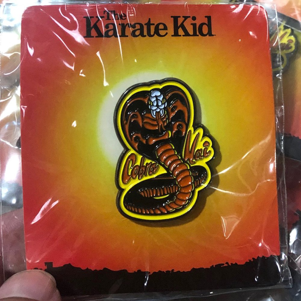 iconheroes's tweet photo. Packaged pics of the @DesignerCon exclusive limited edition @KarateKidMovie Enamel Pins, available at our booth #2602. #DCon2019 #DCon19 #DesignerCon #DesignerCon19 #DesignerCon2019 #karatekid #thekaratekid #cobrakai https://t.co/rL1zgeNtZq