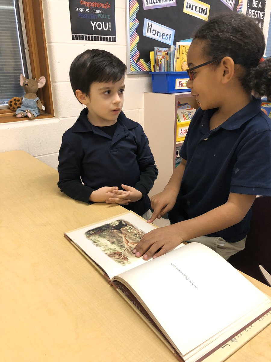 PalmElementary's tweet photo. Ms. Rees’ first graders are partner reading a text about Jane Goodall. Look how excited they are! 📚 https://t.co/CPKPpPaJOm