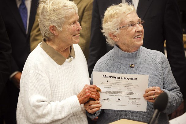 Two senior citizen women hold a marriage license on Dec. 6, 2012, as King County begins issuing the first marriage licenses to same-sex couples.