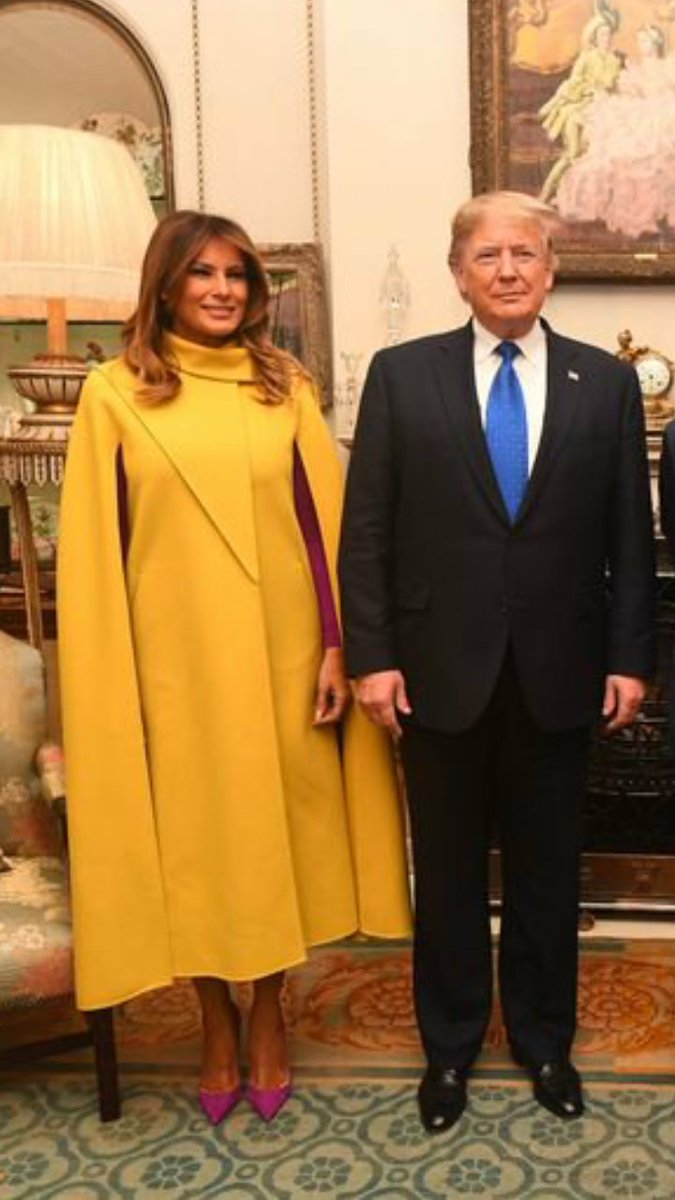 EpsteinRob's tweet image. This looks photo shopped to me.  I recognize the hooker in yellow, but who or what the fuck is the almost thin almost not orange asshole next to her?  And why is it so short