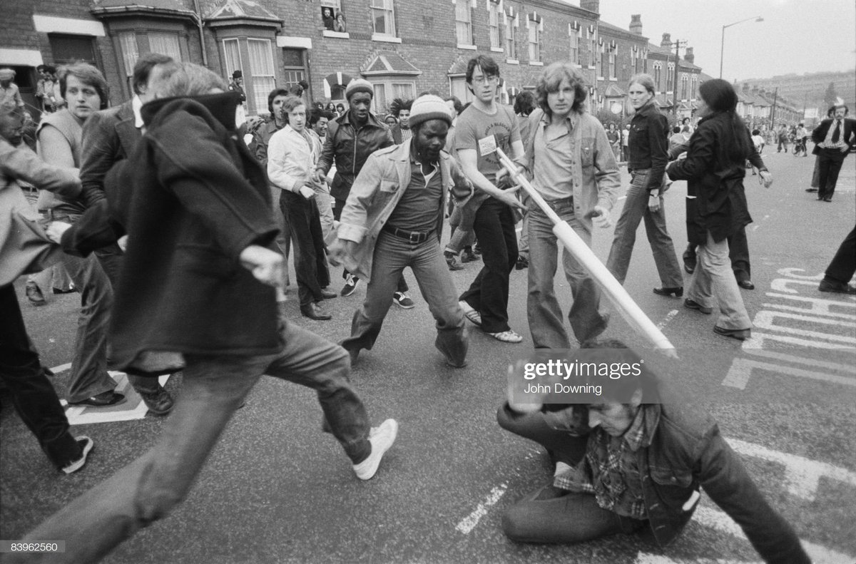 The 1970s seen the rise of the fascist National Front, and by the mid-1970s it was briefly the UK's fourth-largest party in terms of vote share..People fought back..Clash between NF supporters and right minded locals in Birmingham, 16th August 1977. Photo by John Downing