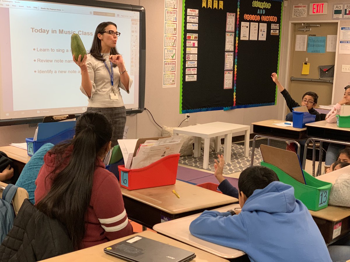 JoAnnLeleckES's tweet photo. Our music teacher, Mrs. Vranic, uses realia and shows the students a papaya since they’re learning the musical notes in a new song, Shake the Papaya Down. #TeachingELLs #Realia #Engagement https://t.co/tjY8Stu0VY