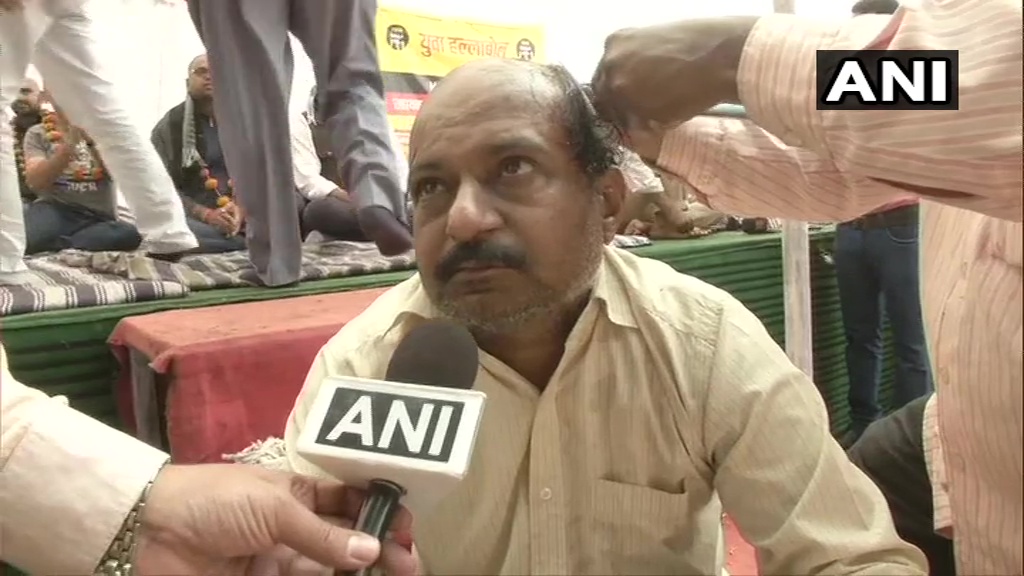 ANI's tweet photo. Protesters: We will not move from here until we get the order of appointment. We are very poor and we are very distressed. We somehow got educated and cleared the exam. The govt should understand this. Our parents look at us with a lot of hope, what do we do? (02.12.2019) https://t.co/TU40GopXUV