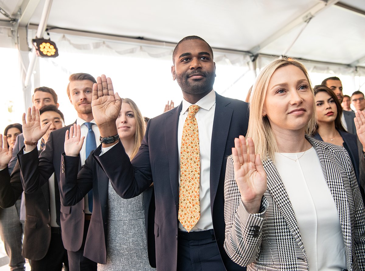 LoyolaLawSchool's tweet photo. "Life's about moments, and this is one!" said Dean Waterstone at this morning's Swearing-In Ceremony for newly minted attorneys. Congrats to all those among the 80% of #LLS alumni to pass the July 2019 California Bar Exam as first-time takers! #LLSSwearingIn https://t.co/mY6zQ4OrFB
