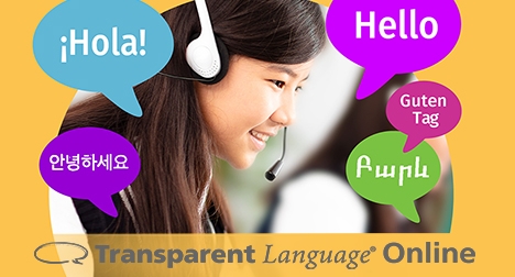 a young girl smiling on a headset, side profile