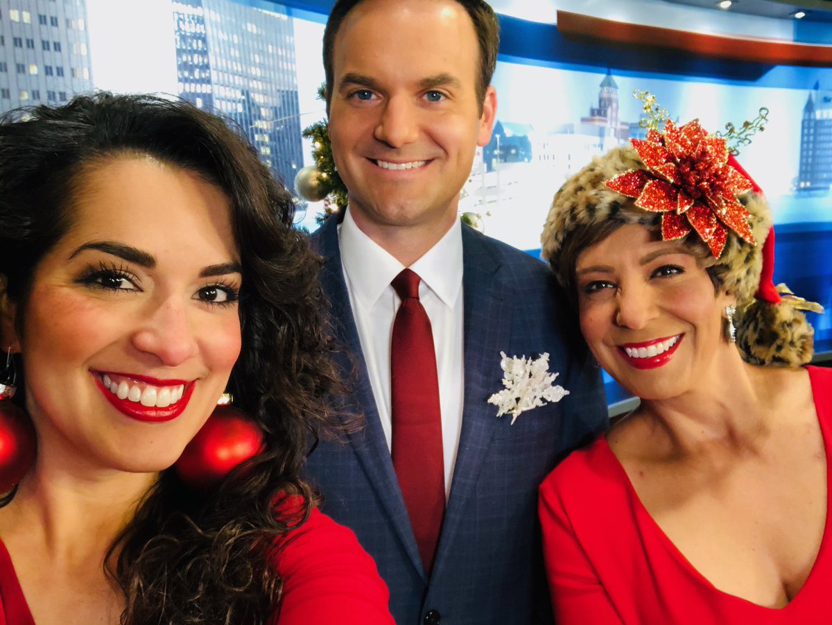 Feeling festive!  Wearing Christmas ornaments to add holiday spirt to our KVIA promo shoot!
