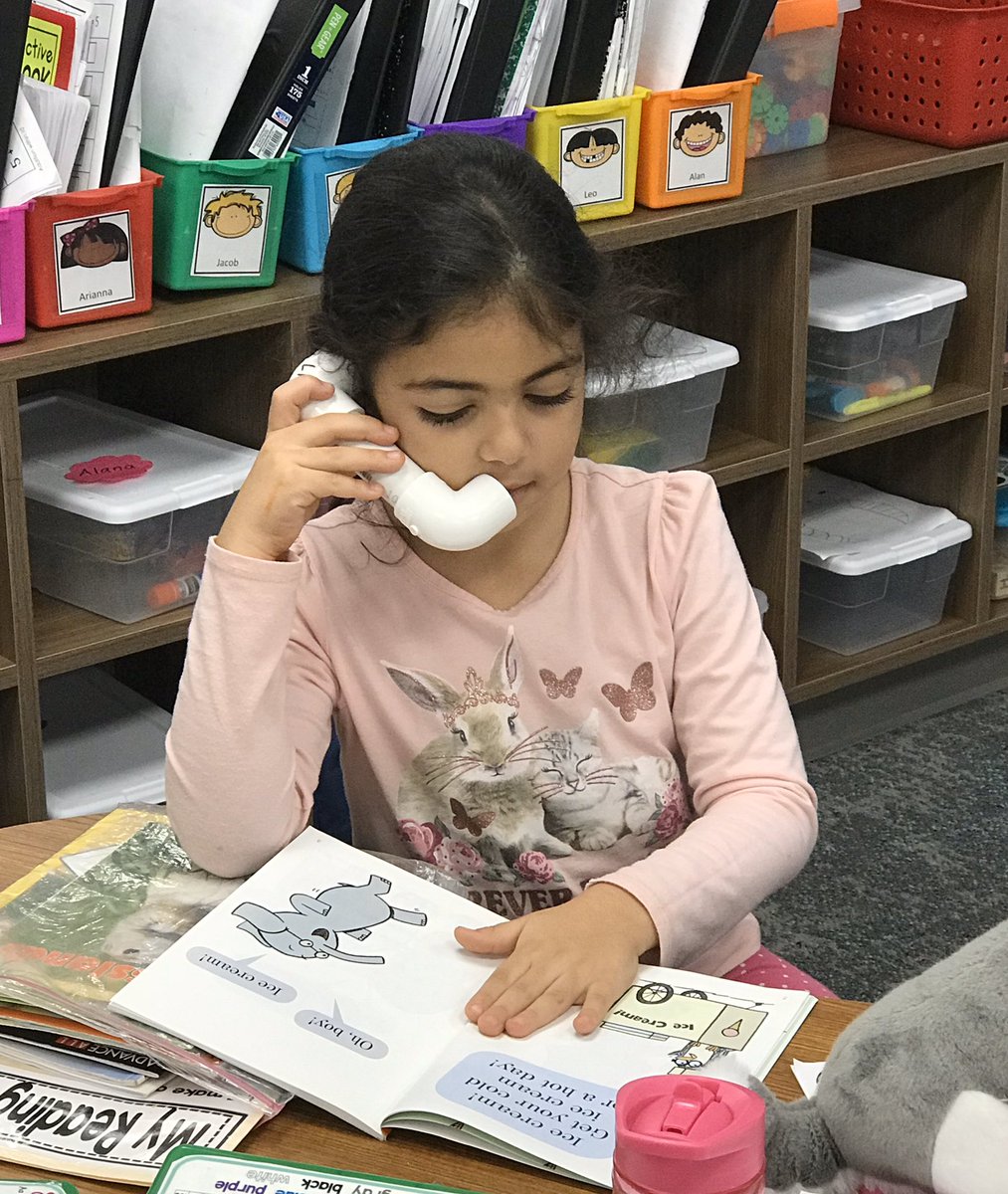 Using our teacher-made whisper phones to become better readers.#creechpride