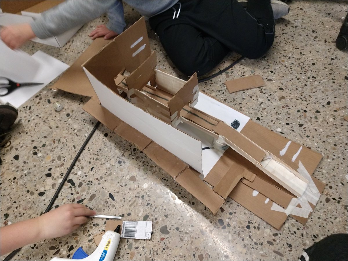 #egrmsInnovationLab students are busy building their #ozoBoxes in 6th Grade Innovation Lab! @Ozobot #makerspace #edtechchat #edtech #cardboardCreations #lineCoding