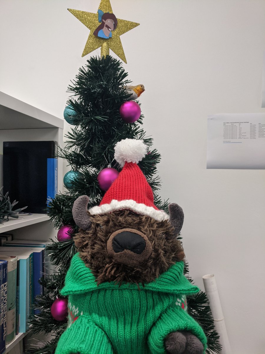 bison_in_space's tweet photo. Ho ho ho! My friend and colleague Emma made me a festive crocheted hat for the group Christmas meal! Merry Christmas one and all 🎄🎅🎁 https://t.co/VnYgg74JcP