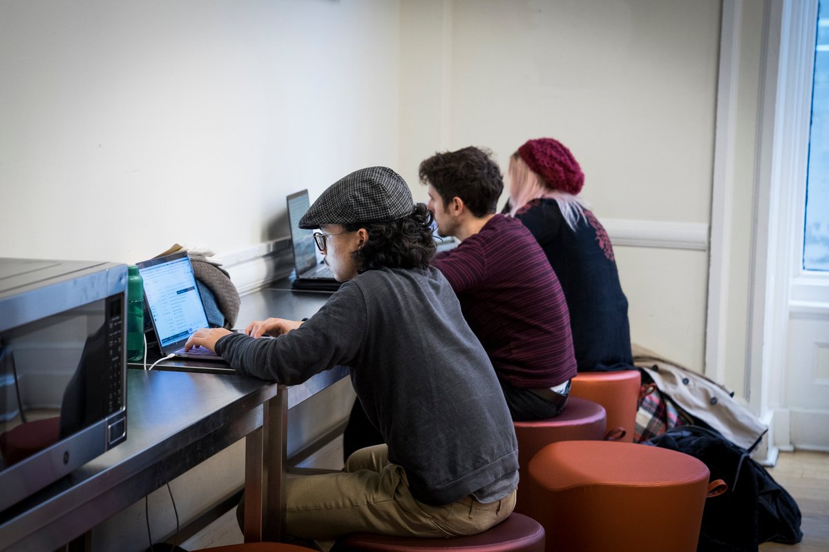 Students looking at their computers