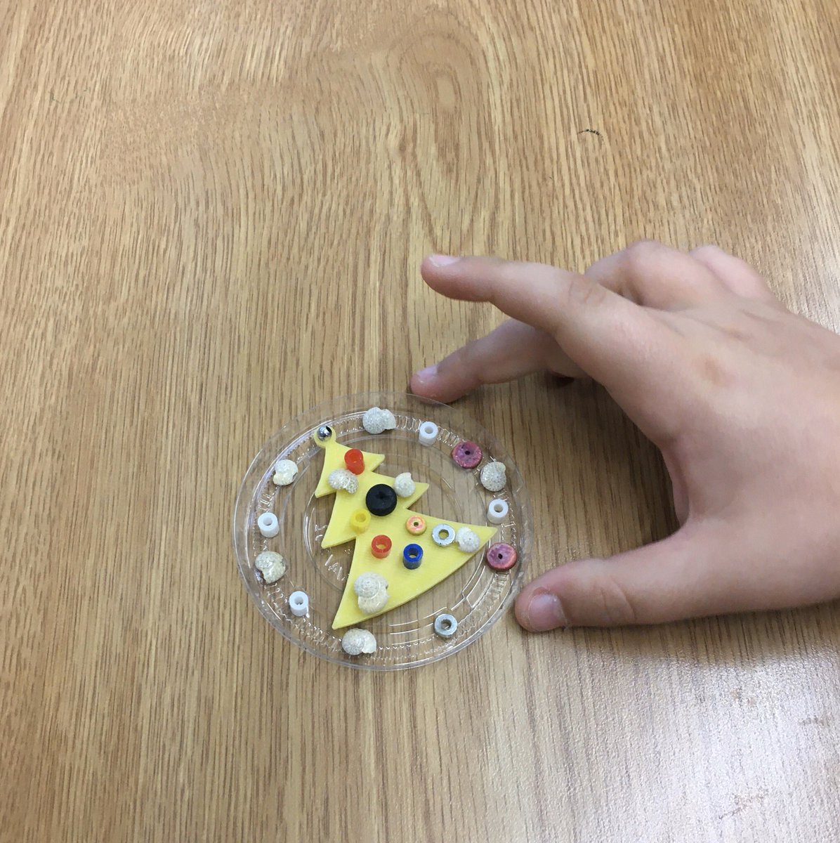crosland_a's tweet photo. Gr 3 using challenging,super teeny tiny #looseparts to cooperatively create our winter #3DPrint tree. Biggest take away for the students was ‘We need to communicate our ideas and plan ahead’ #Shells #PerlerBeads #WoodenDiscs #CupLids #BigIdeas #sd36learn #sd36tl #tlchat https://t.co/F8KwZOv91y