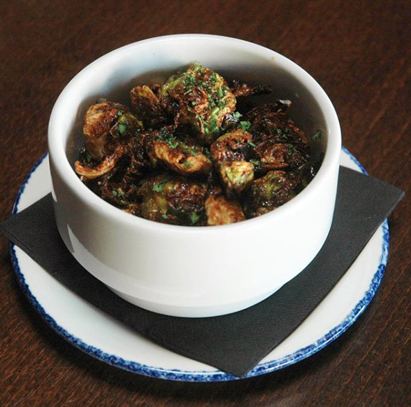 coteestla's tweet photo. #Cozy up with a bowl of our crispy Fried Brussels Sprouts tonight💚 https://t.co/7OqKWFjBG2