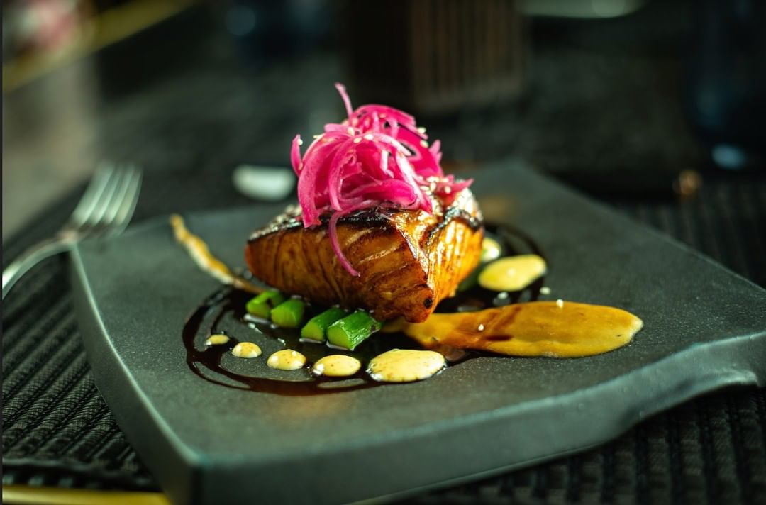 Beautiful miso salmon with ginger carrot cream from @ZengoDoha. #doha