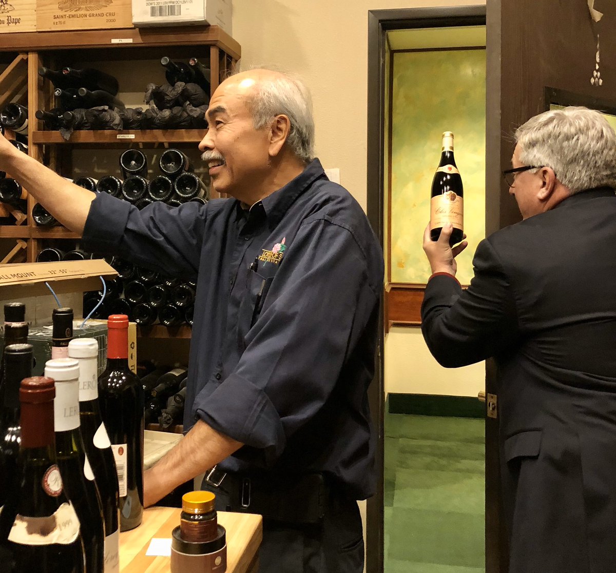 eatinglasvegas's tweet photo. Me trying to steal a Grand Cru Burgundy from @LotusOfSiam while owner Bill Chutima was being cleverly distracted by The Food Gal. #caughtintheact #caughtoncamera #shameless #Burghound πππ·ππΉπ π«π· https://t.co/vuuuBJuFuQ