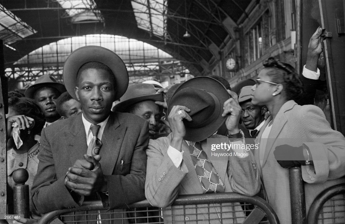 Arrivals at Victoria Station, London, after their journey from Southampton Docks, 1956. Photo by Haywood Magee