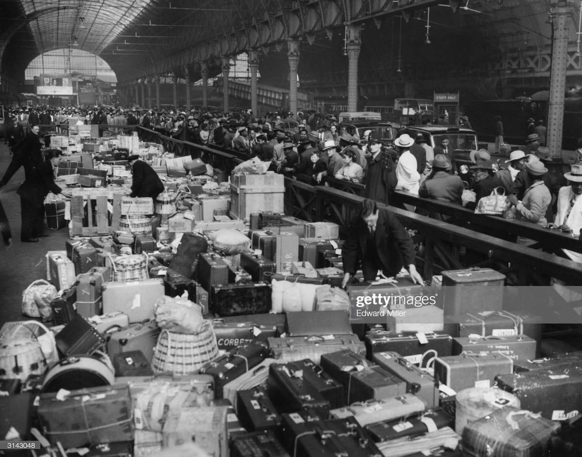 The luggage of 1000 newly arrived immigrants at Paddington Station in London, 9th April 1956. Photo by Edward Miller