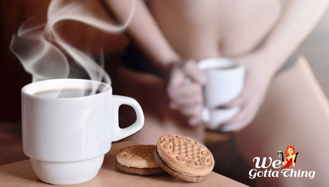 Gentle Nude Woman Sitting On Windowsill With Cup Of Coffee Posture, Side View