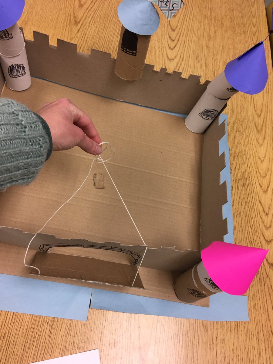MrsCherryEL's tweet photo. THANKFUL for student-created castle from recycled materials. Students described parts of the castle and the process of making it on SeeSaw using transition words. Student-created rubric. Magic Tree House #2 - The Knight at Dawn #FAMEatBES @brookhillelem https://t.co/yCAzBYPfCu