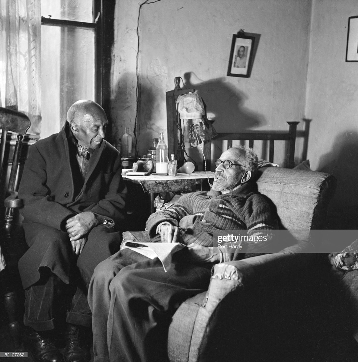Two elderly gentlemen in Bute Town, Cardiff, 1950. Photo by Bert Hardy
