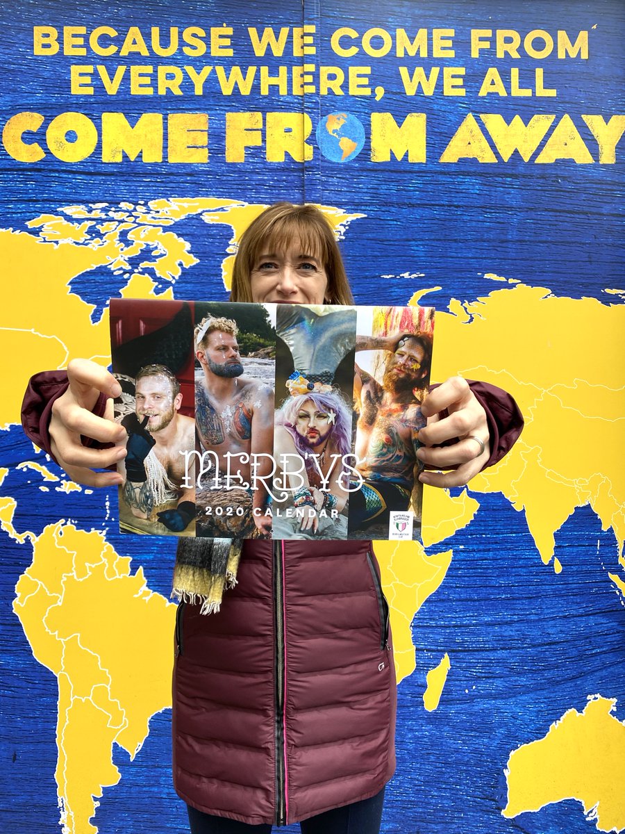 Petrina Bromley holding a calendar. 